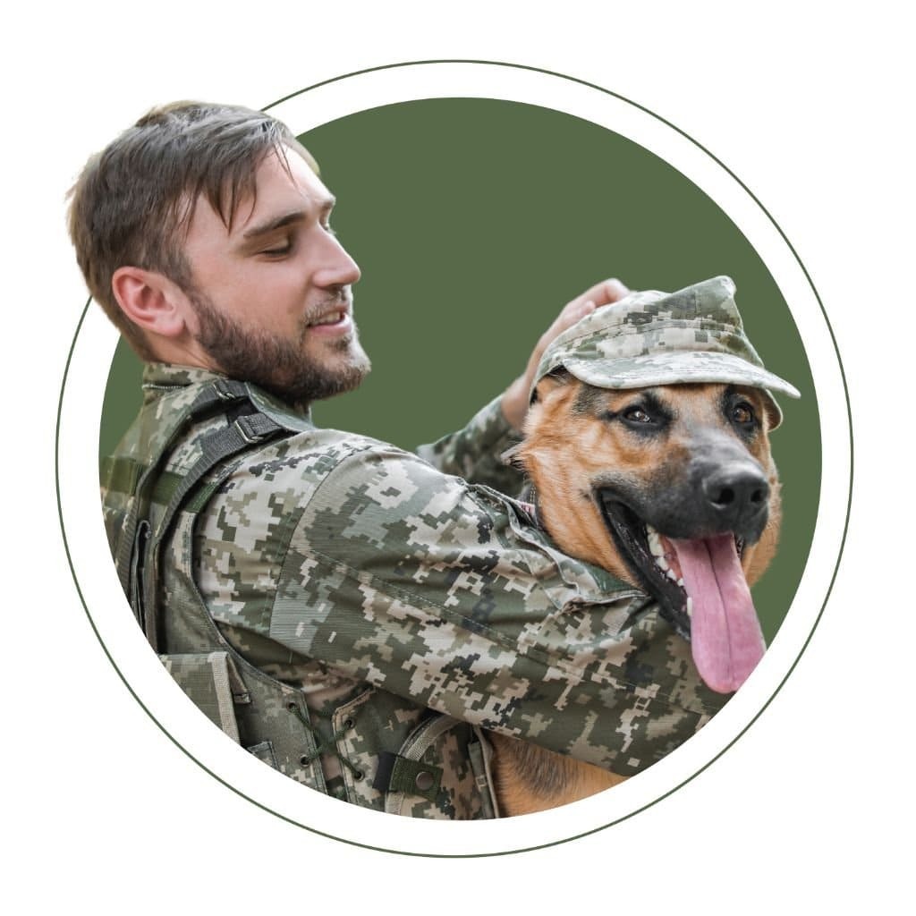 Member of Military Holding German Shepherd Dog
